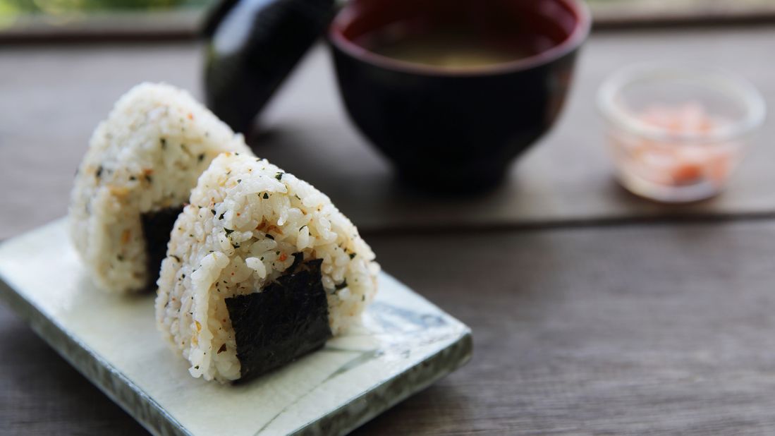 <strong>Onigiri: </strong>A staple bento box snack, onigiri is made from steamed Japanese rice shaped into a triangular form and wrapped with the seaweed called nori. 