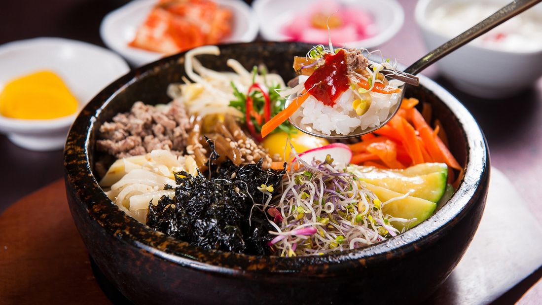 <strong>Bibimbap:</strong> Its name translates to "mixed rice" and bibimbap consists of rice served in a bowl and topped with a colorful array of individually prepared meats and artfully sliced vegetables.