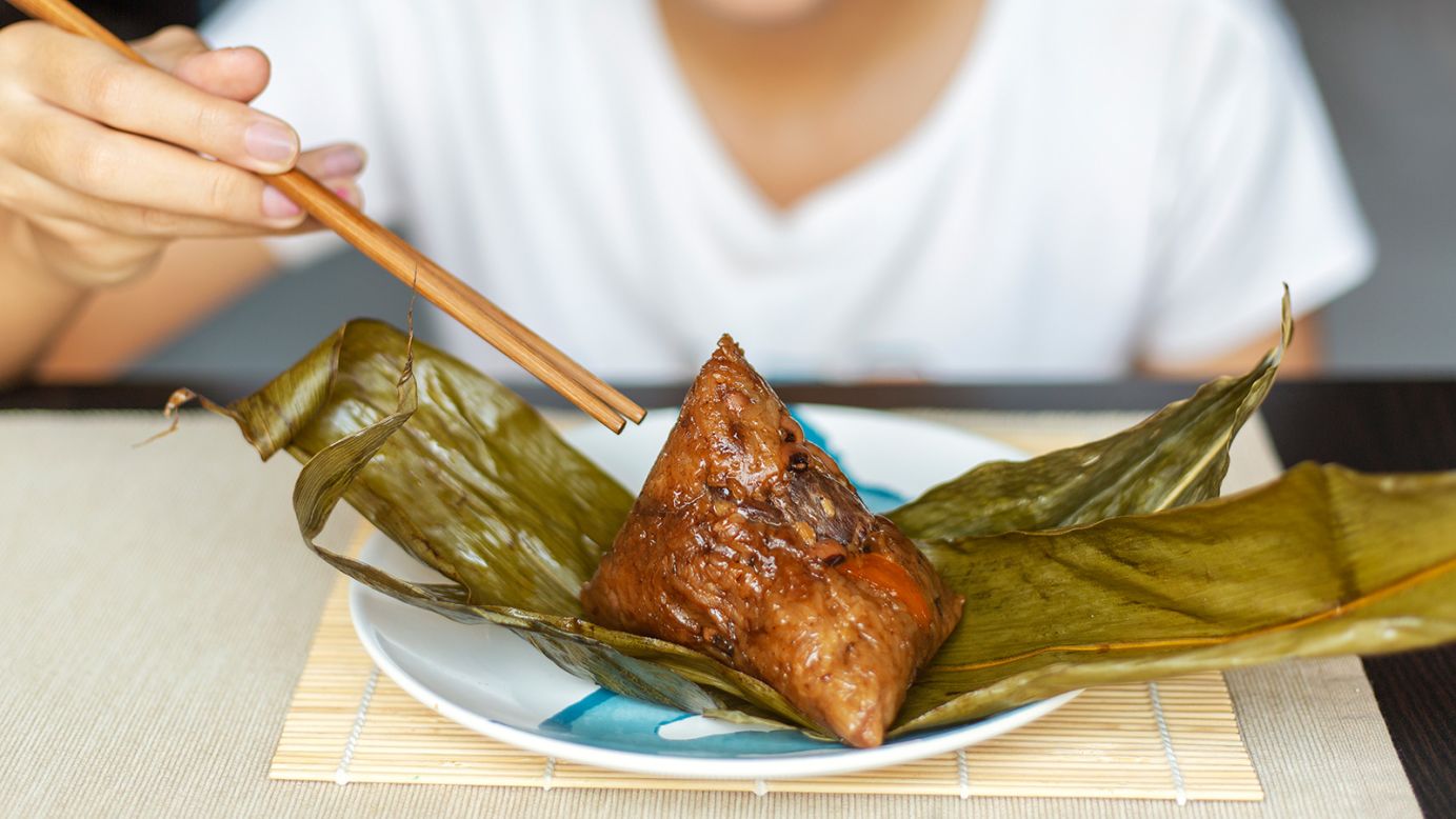 <strong>Zongzi:</strong> Found in various iterations all over China, zongzi refers to sticky glutinous rice dumplings wrapped in bamboo leaves before boiling that can be stuffed with savory or sweet fillings.