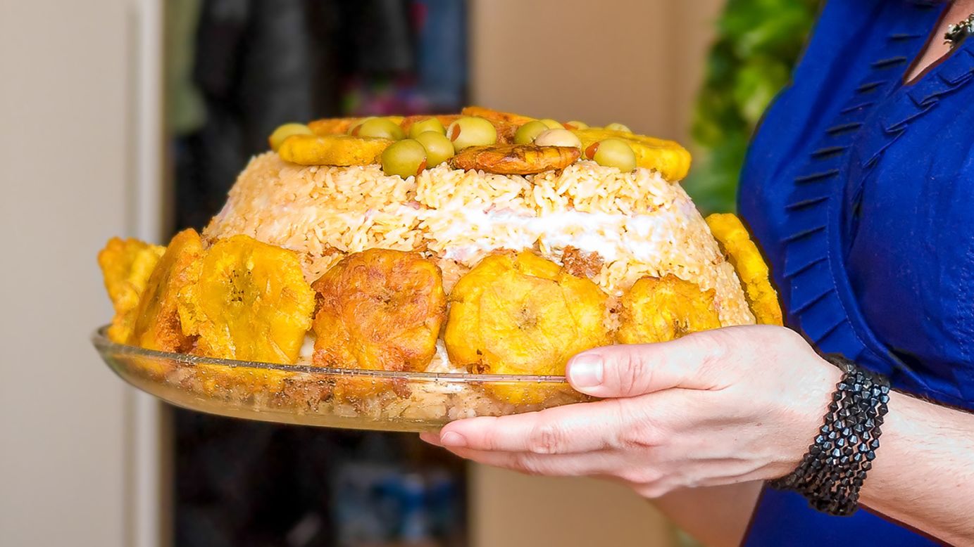 <strong>Arroz imperial: </strong>One of Cuba's classic comfort rice dishes, arroz imperial is typically layered with yellow rice, shredded chicken, mayonnaise (to help bind it and for flavor) and cheese and is sometimes baked.