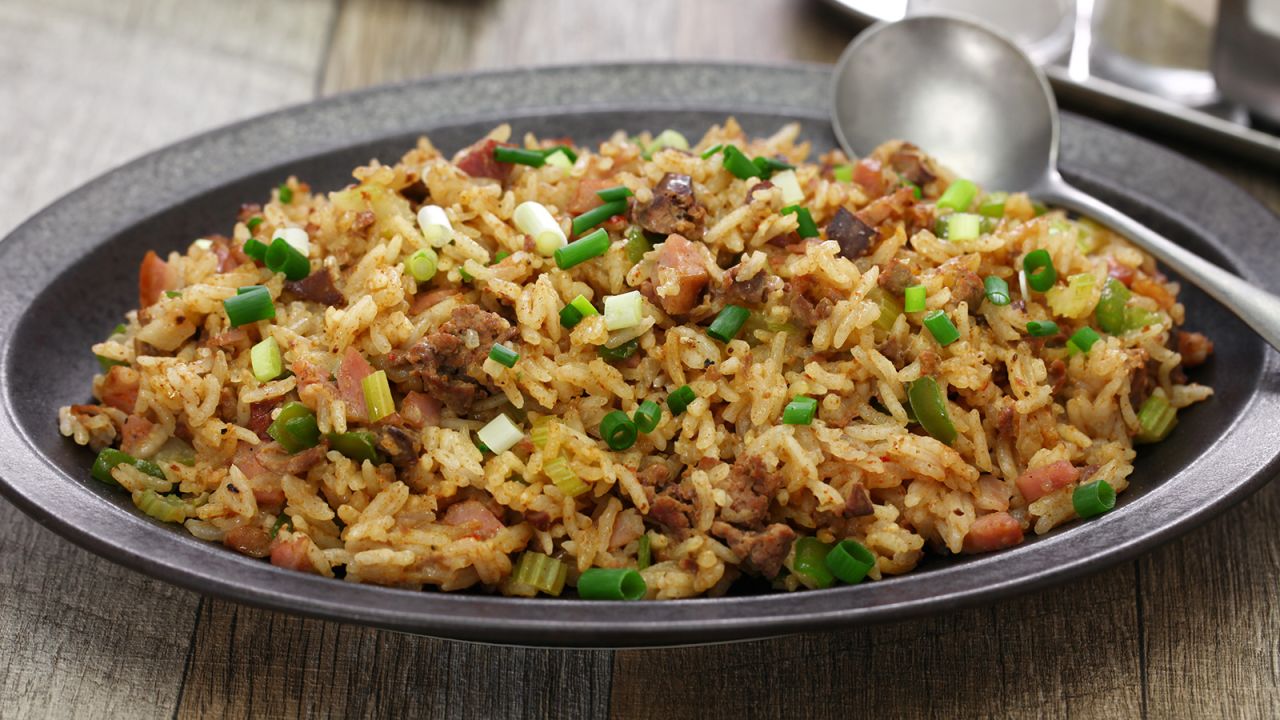 In traditional recipes, chopped chicken livers or gizzards give the white rice its "dirty" color.