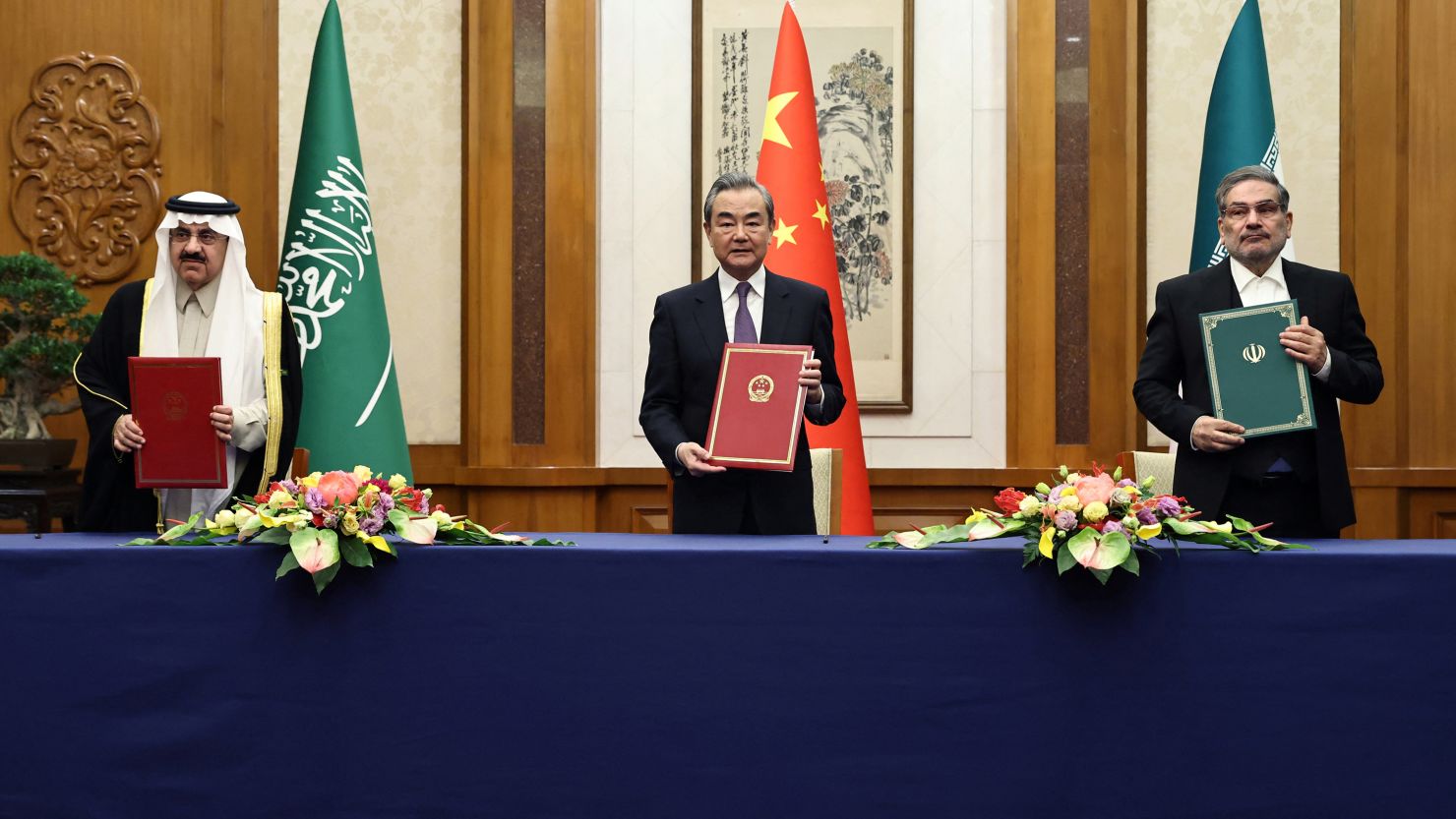 Wang Yi, China's top diplomat, with Secretary of Iran's Supreme National Security Council Ali Shamkhani and national security adviser of Saudi Arabia Musaad bin Mohammed Al Aiban in Beijing on March 10, 2023. 