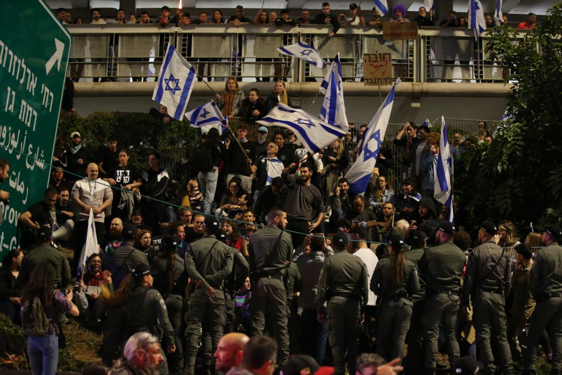 Israelis take part in a rally in Tel Aviv on Saturday to protest major changes to the country's judicial system.