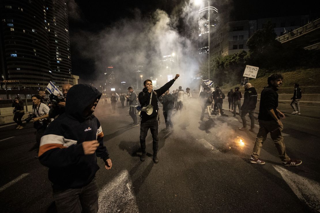 Demonstrators clash with police during protests in Tel Aviv on Saturday.