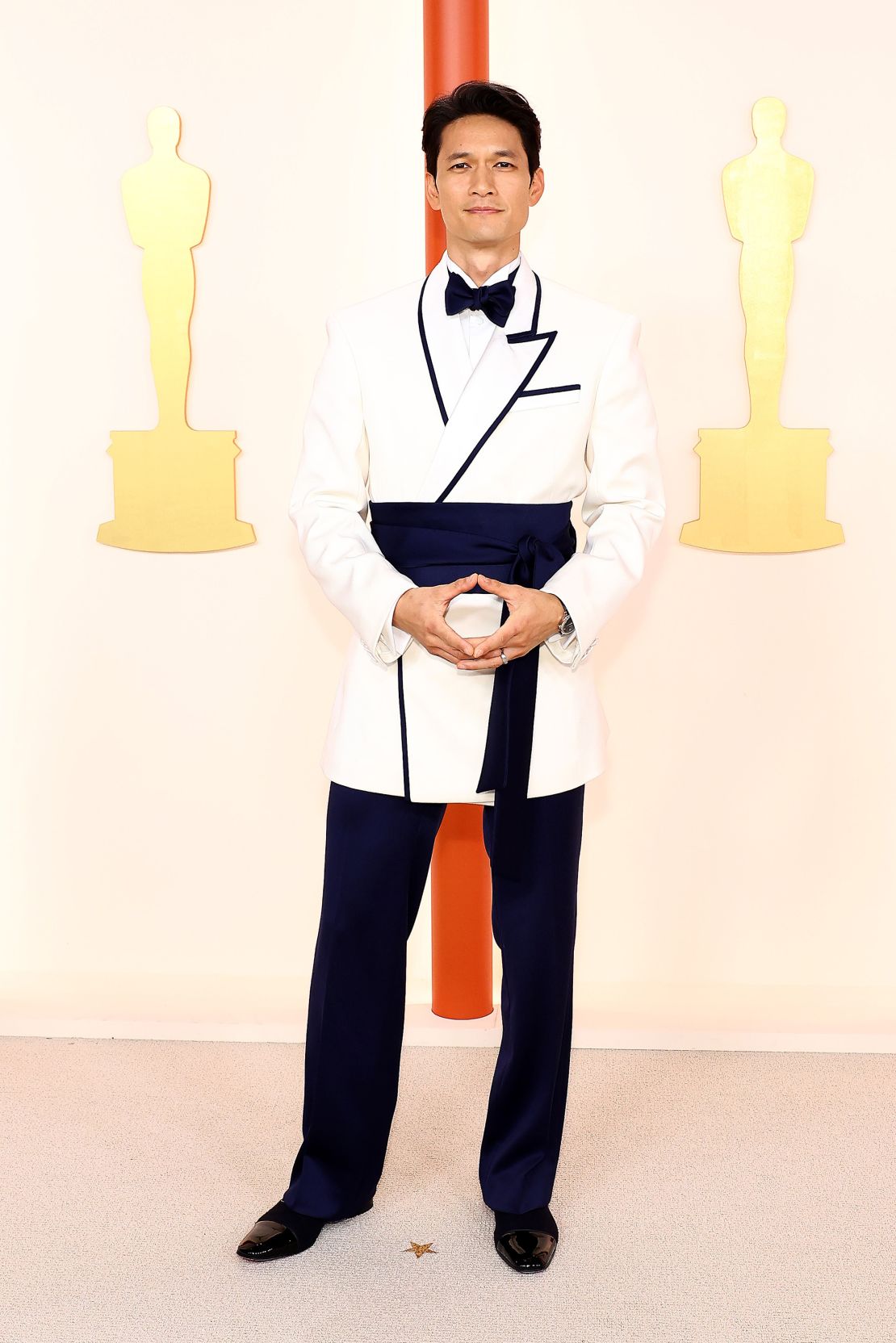 Harry Shum Jr. wore a tuxedo by Adeam — a label usually known for womenswear — that featured a white jacket and a fabric belt at the waist.