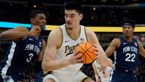 Penn State Nittany Lions forward Kebba Njie (3) defends Purdue Boilermakers center Zach Edey (15).