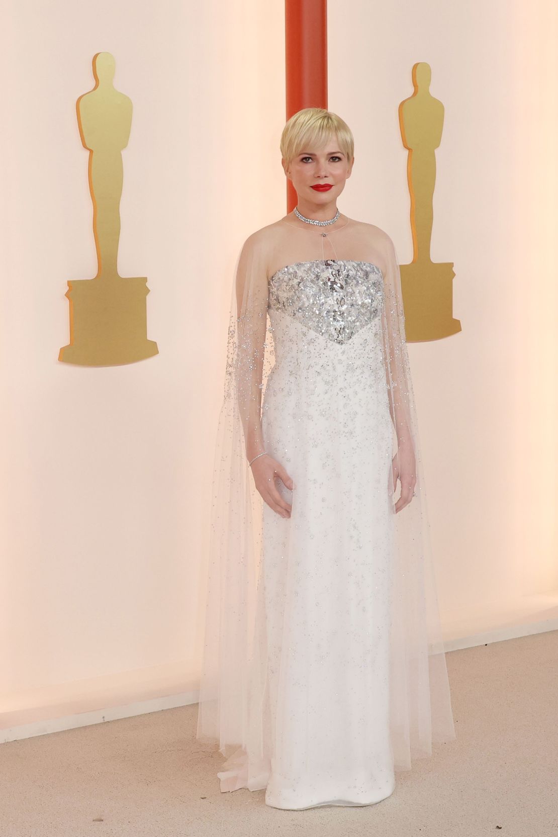 Ana de Armas Wears Bejeweled Louis Vuitton Gown to 2023 Golden Globes