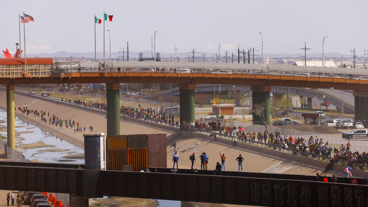 A large group made a formation and approached the border, Customs and Border Protection said Sunday.