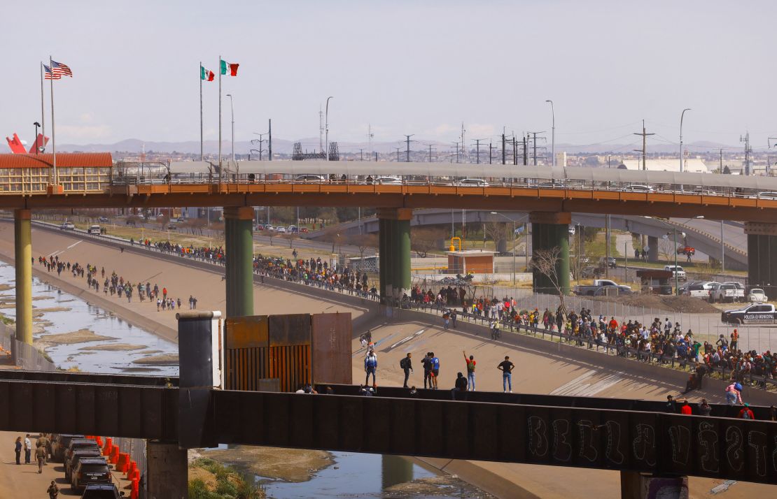 A large group made a formation and approached the border, Customs and Border Protection said Sunday.