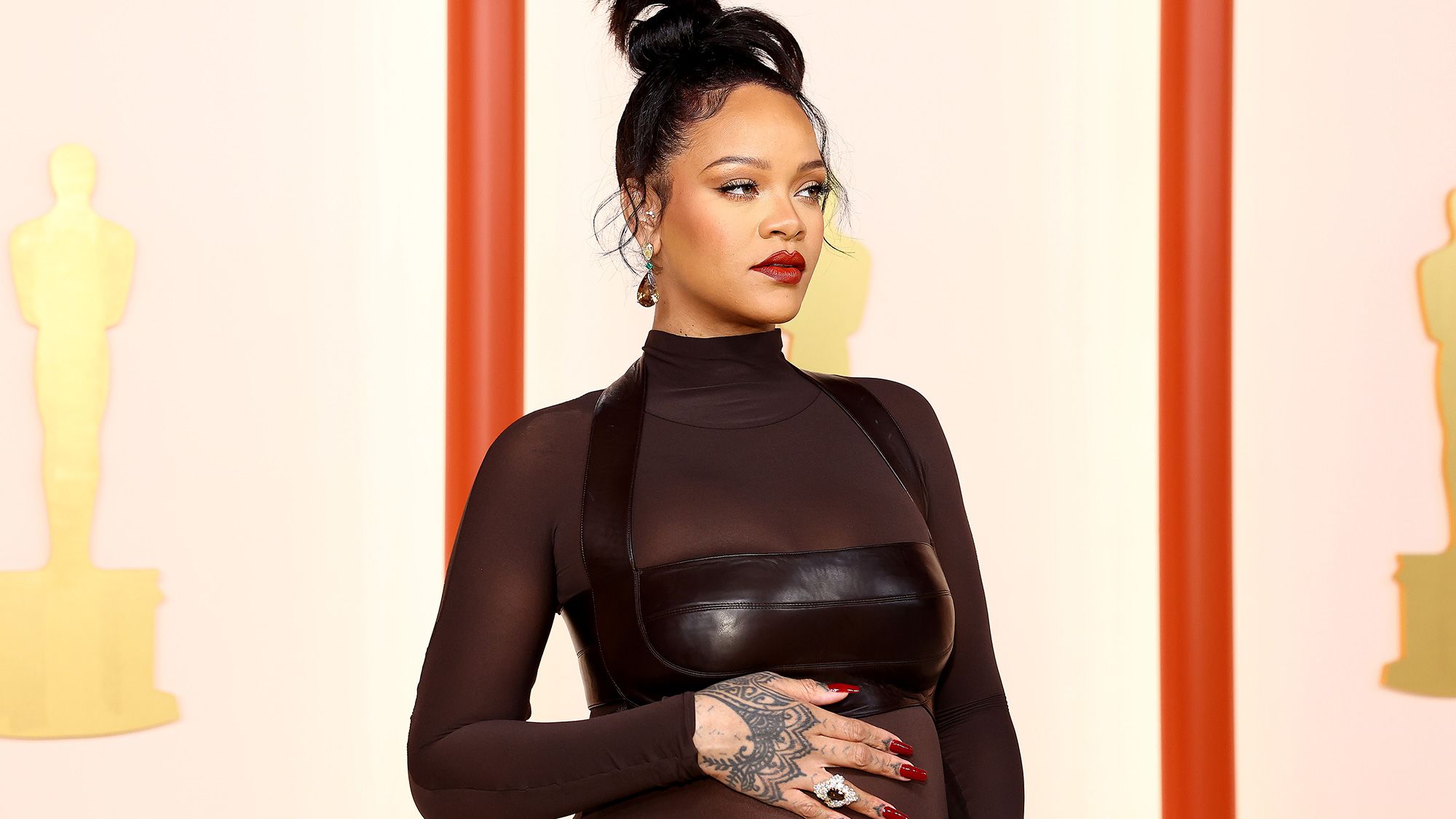 Pregnant Rihanna in Belly-Baring Outfit with A$AP Rocky at Oscars 2023