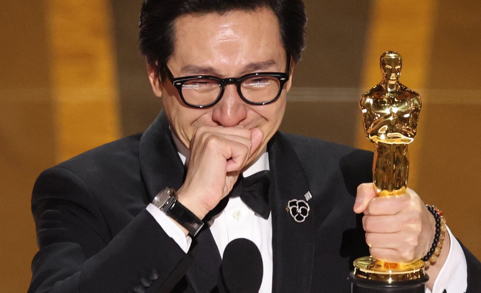 Quan gives a speech after winning the Oscar for best supporting actor. Quan, who won for his role in "Everything Everywhere All at Once," addressed his 84-year-old mother in his <a href="index.php?page=&url=https%3A%2F%2Fwww.cnn.com%2Fentertainment%2Flive-news%2Foscars-2023%2Fh_01ec689e05123e42b84b80b06abc221c" target="_blank">tearful speech</a>: "Mom, I just won an Oscar!"