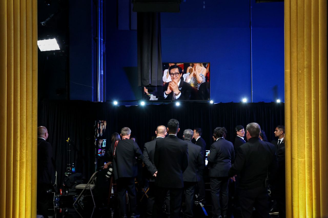 Actor Ke Huy Quan is seen on a monitor backstage.