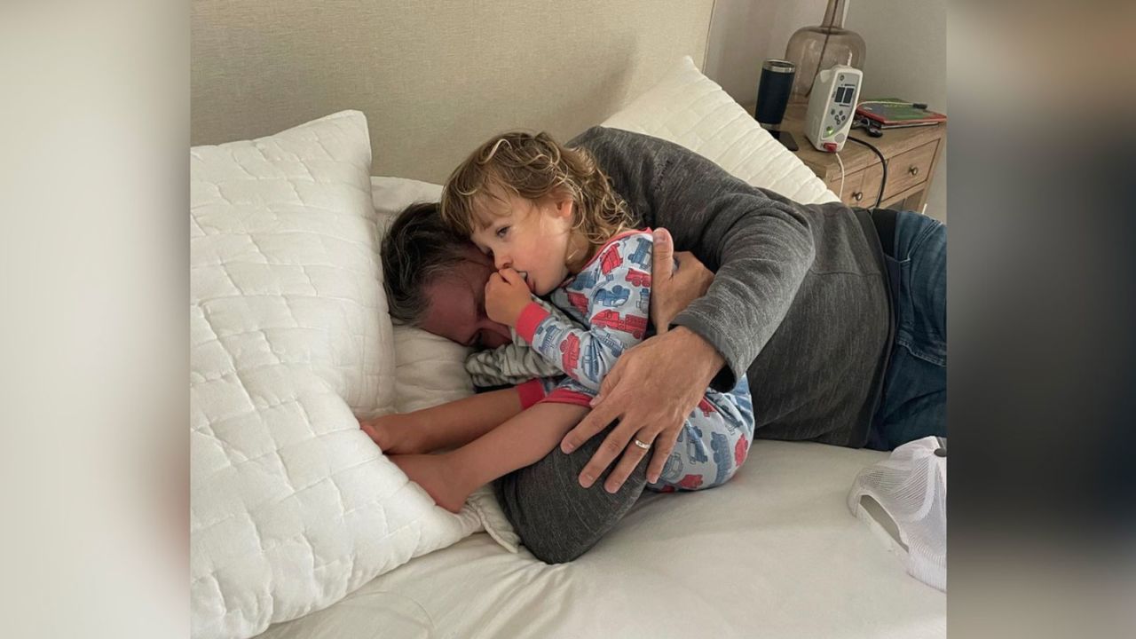 Anthony Saladino holding his son.