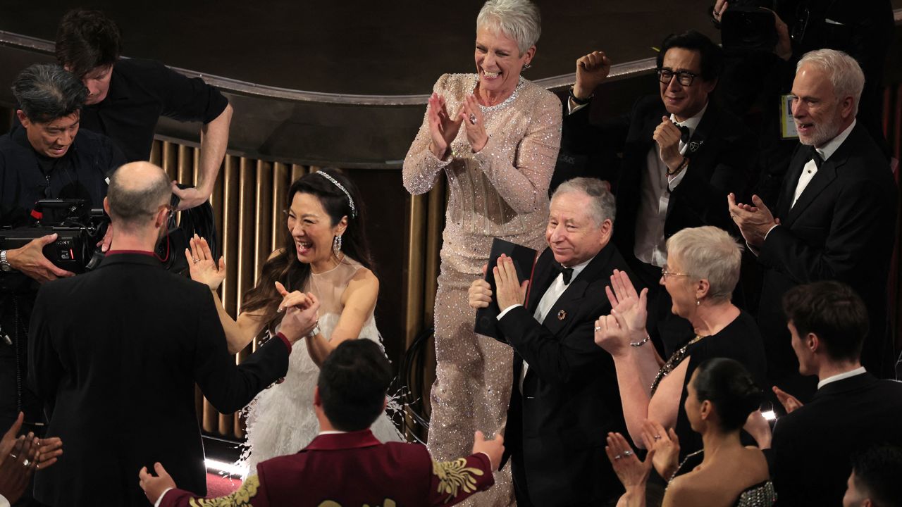 Daniel Kwan and Daniel Scheinert win the Oscar for Best Director for "Everything Everywhere All at Once" during the Oscars show at the 95th Academy Awards.