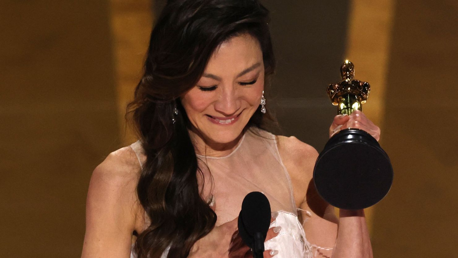 Michelle Yeoh accepts the Oscar for Best Actress for "Everything Everywhere All at Once" during the Oscars show at the 95th Academy Awards.