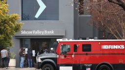 A Brinks armored truck sits parked in front of the shuttered Silicon Valley Bank (SVB) headquarters on March 10, 2023 in Santa Clara, California. Silicon Valley Bank was shut down on Friday morning by California regulators and was put in control of the U.S. Federal Deposit Insurance Corporation. Prior to being shut down by regulators, shares of SVB were halted Friday morning after falling more than 60% in premarket trading following a 60% declined on Thursday when the bank sold off a portfolio of US Treasuries and $1.75 billion in shares to cover  declining customer deposits.