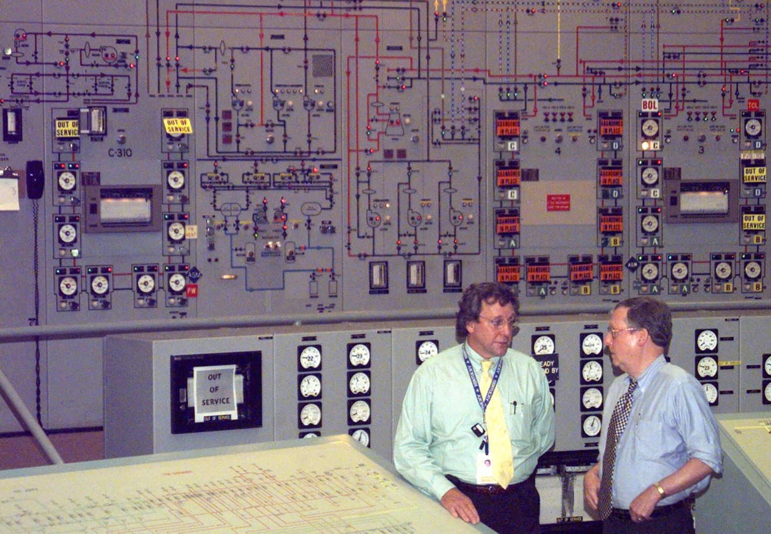 McConnell, right, is given a personal tour of a gaseous diffusion plant near Paducah, Kentucky, in August 1999. The plant produced enriched uranium until 2013.