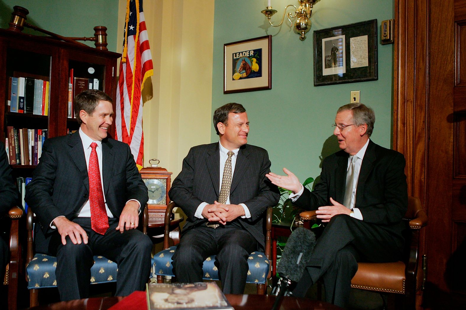 McConnell, right, and Senate Majority Leader Bill Frist, left, meet with Supreme Court nominee John Roberts at the US Capitol in July 2005. McConnell at the time was Senate Republican Whip. He would replace Frist as GOP leader in 2007.