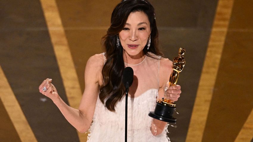 TOPSHOT - Malaysian actress Michelle Yeoh accepts the Oscar for Best Actress in a Leading Role for "Everything Everywhere All at Once" onstage during the 95th Annual Academy Awards at the Dolby Theatre in Hollywood, California on March 12, 2023. (Photo by Patrick T. Fallon / AFP) (Photo by PATRICK T. FALLON/AFP via Getty Images)