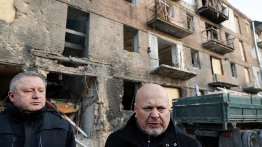 International Criminal Court (ICC) Prosecutor Karim Khan and Ukrainian Prosecutor General Andriy Kostin speak to journalists as they visit the site of a residential building damaged by a Russian missile strike late November, amid Russia's attack on Ukraine, in the town of Vyshhorod, outside Kyiv, Ukraine, February 28, 2023. REUTERS/Valentyn Ogirenko