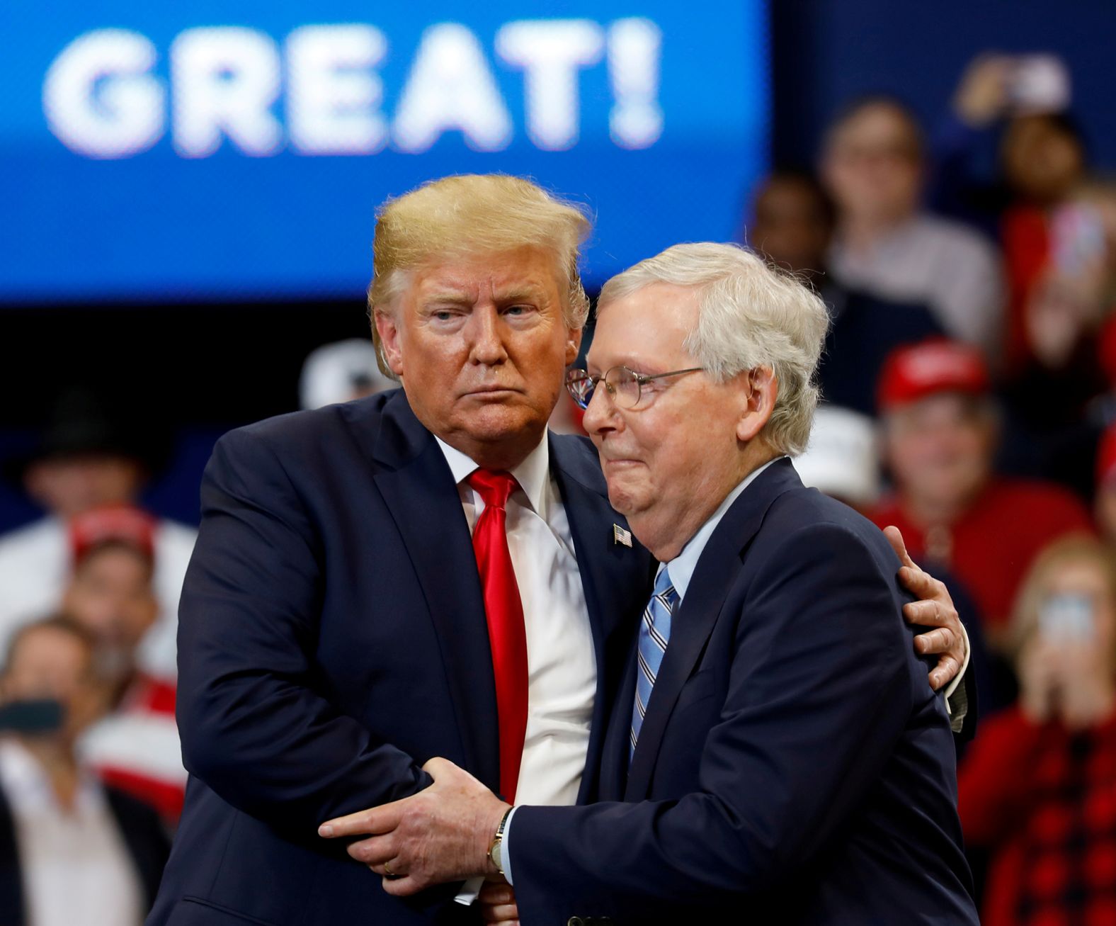 McConnell and Trump shake hands at a campaign rally in Lexington, Kentucky, in November 2019.