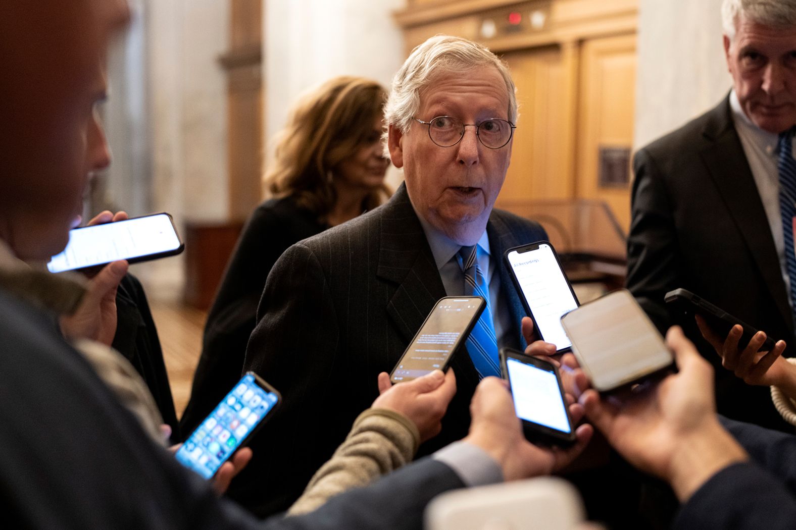 McConnell speaks to reporters at the Capitol after meeting with Biden and congressional leaders at the White House in November 2022.