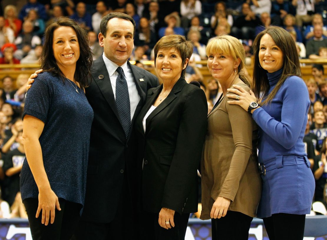 Krzyzewski stands with his family as he is acknowledged for breaking the record for wins in NCAA men's basketball at Cameron Indoor Stadium on November 18, 2011.