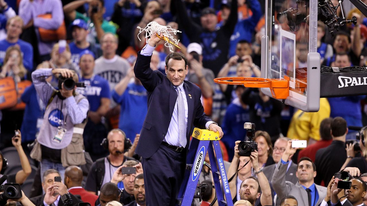 Krzyzewski cuts down the net after defeating the Wisconsin Badgers in the NCAA men's national championship game at Lucas Oil Stadium on April 6, 2015.