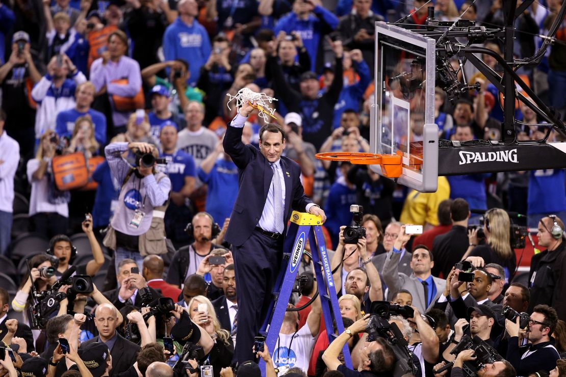 Krzyzewski cuts down the net after defeating the Wisconsin Badgers in the NCAA men's national championship game at Lucas Oil Stadium on April 6, 2015.