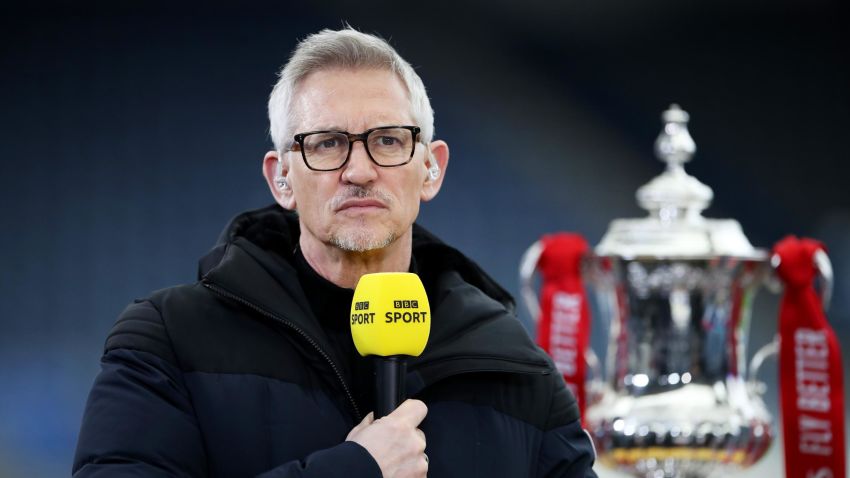 LEICESTER, ENGLAND - MARCH 21: Gary Lineker, BBC Sport TV Pundit looks on whilst standing next to the FA Cup trophy prior to the Emirates FA Cup Quarter Final  match between Leicester City and Manchester United at The King Power Stadium on March 21, 2021 in Leicester, England. Sporting stadiums around the UK remain under strict restrictions due to the Coronavirus Pandemic as Government social distancing laws prohibit fans inside venues resulting in games being played behind closed doors.  (Photo by Alex Pantling/Getty Images)