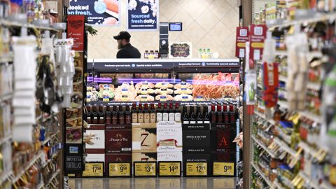  A display of wine is set up in front of the meat and fish department at a Safeway on March 1, 2023, in Aurora, Colorado. Food at home prices have declined in recent months but remain  10.2% higher from last year, according to the February Consumer Price Index.