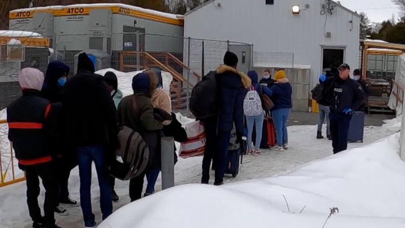 CNN follows migrants illegally entering Canada from New York road | CNN