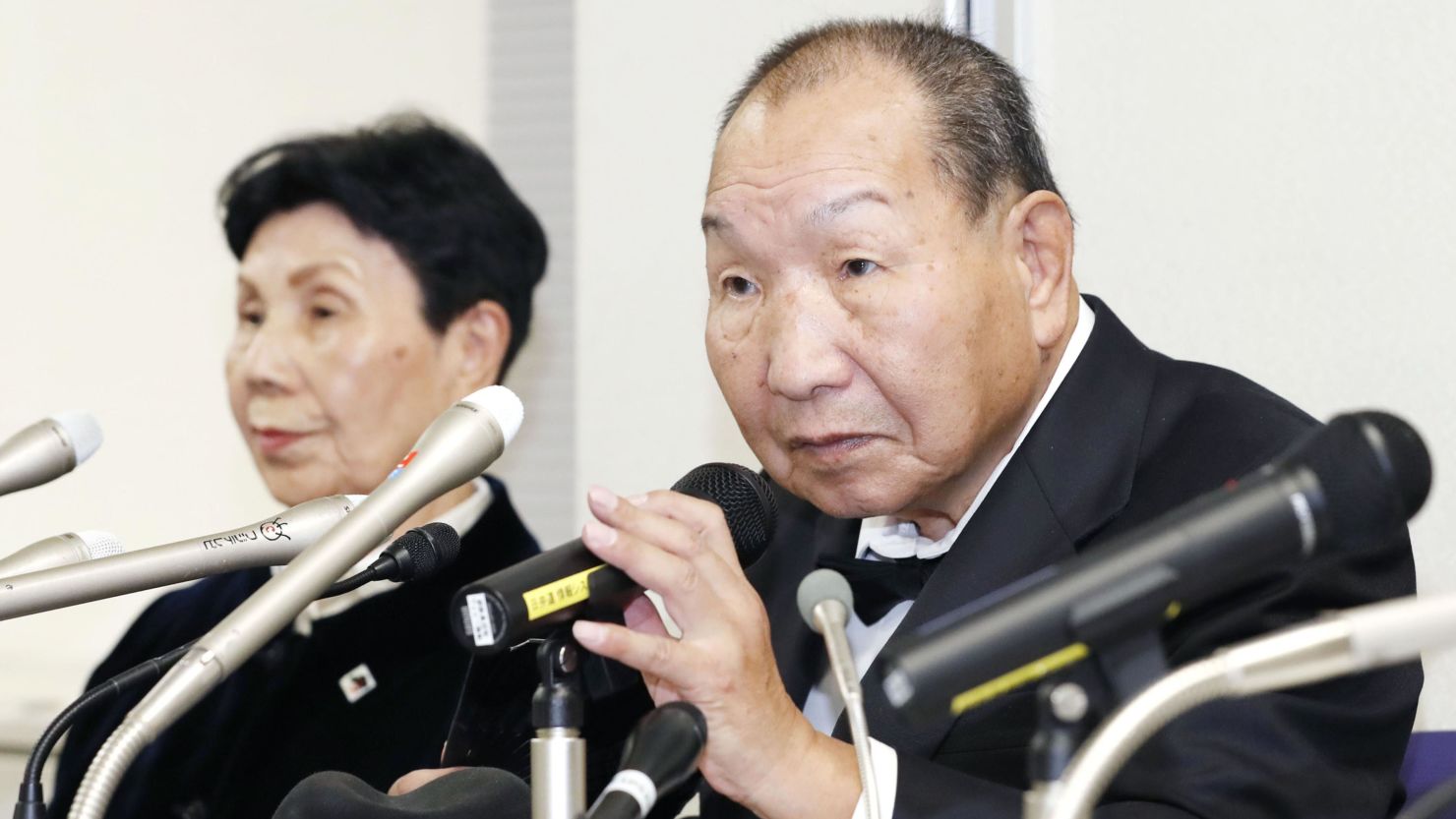 Former professional boxer Iwao Hakamada (right), seen in 2019, spent more than five decades on death row.