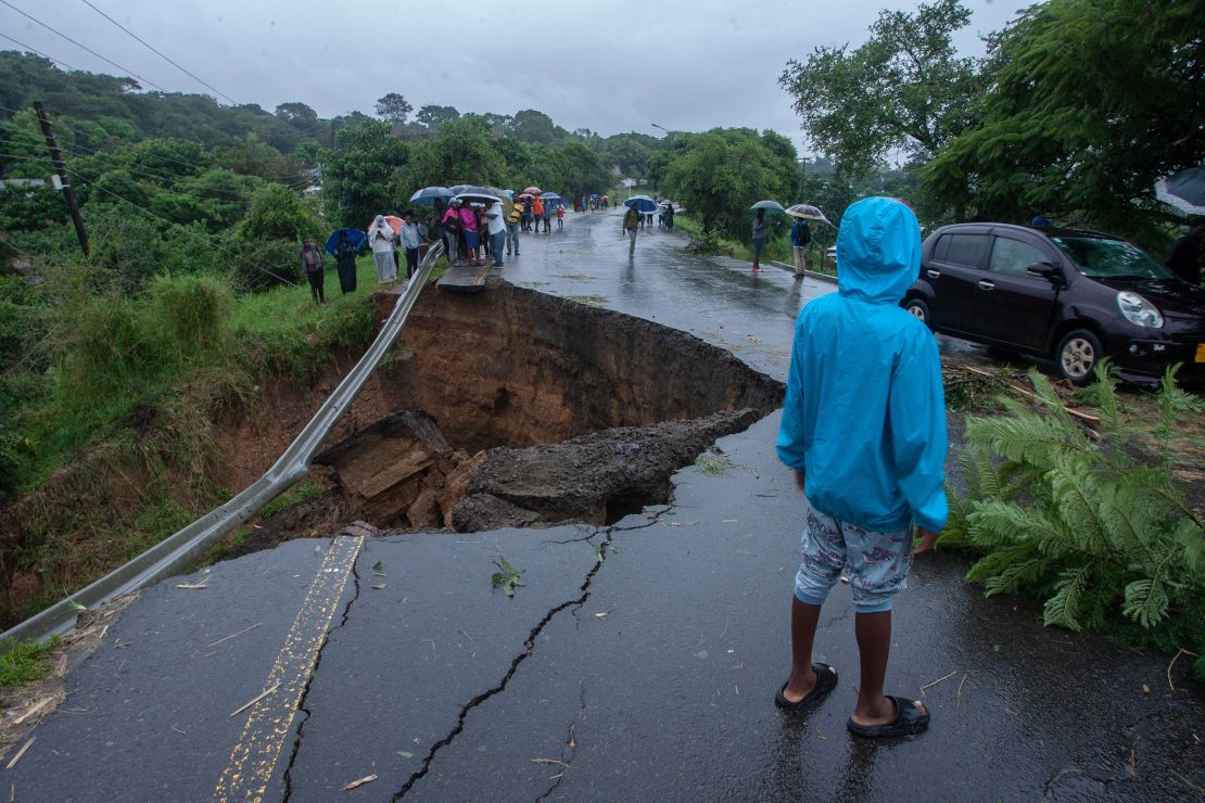 A general view of a collapsed road caused by flooding waters due to heavy rains caused by Tropical Cyclone Freddy in Blantyre, Malawi, on Monday.