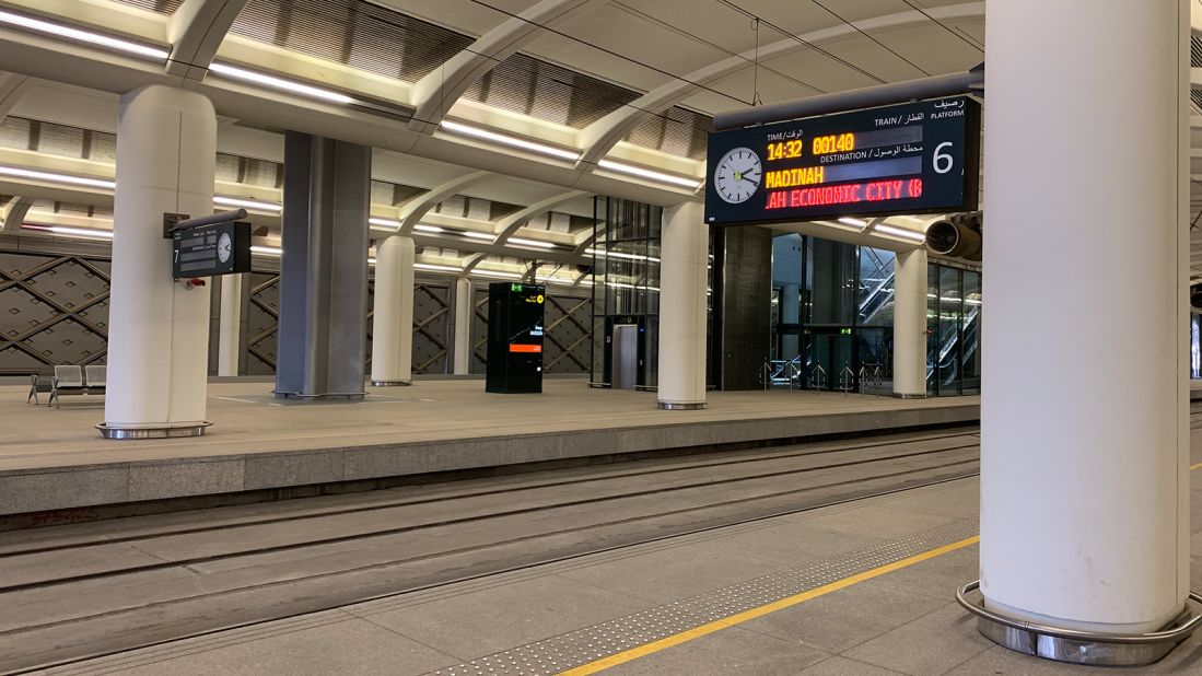 <strong>Boarding time:</strong> Passengers are escorted from the waiting area to the platform by station staff.