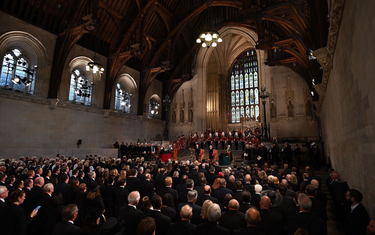 Charles and Camilla stand for the national anthem following addresses by both houses of Parliament in September 2022.