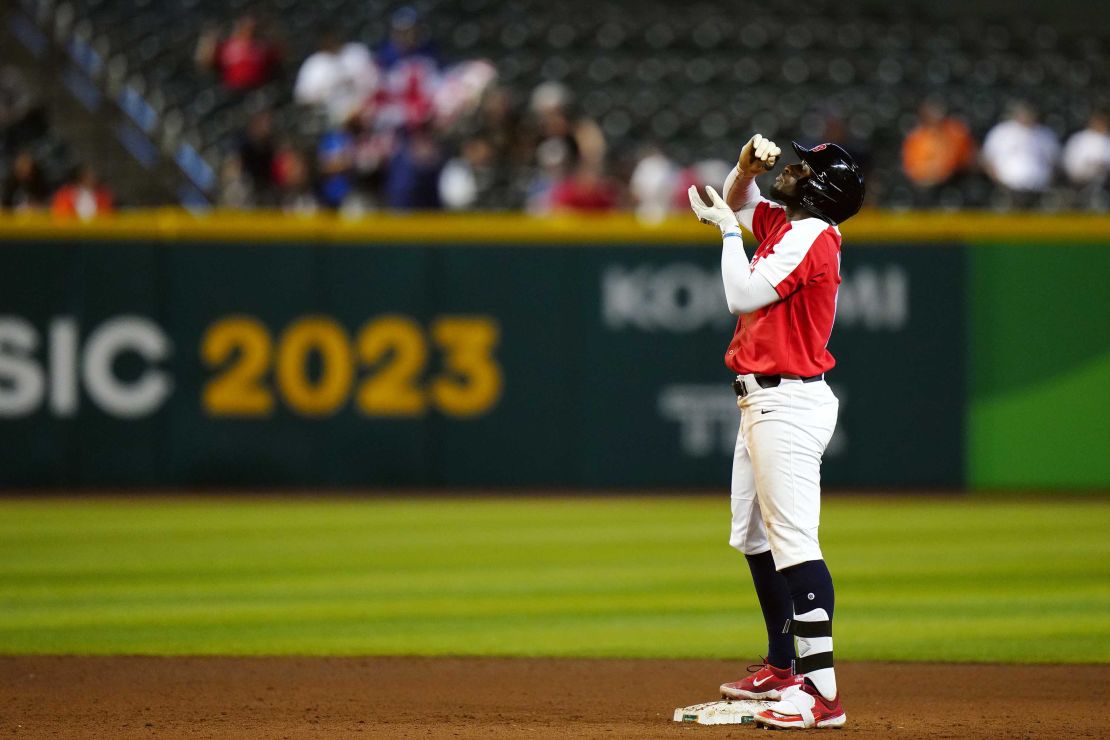 Chavez Young sips a cup of tea after hitting a two-run single in the fourth inning.