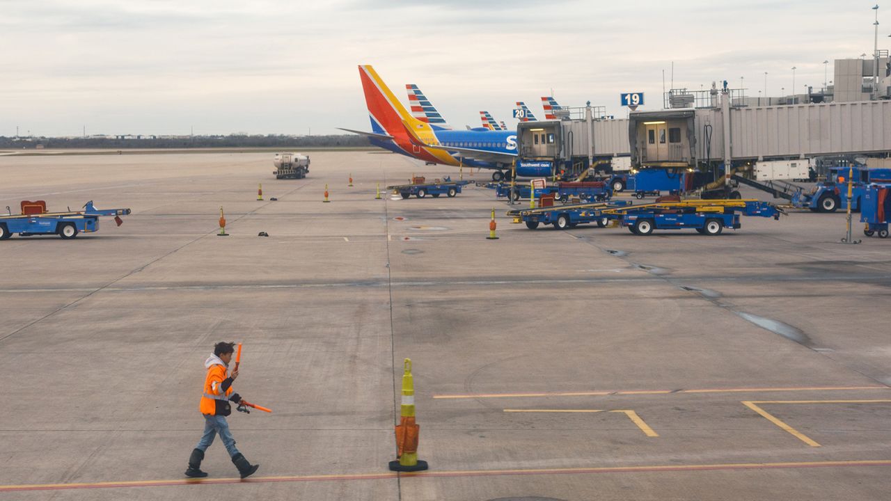 A worker on the tarmac at Austin-Bergstrom International Airport in Austin, Texas, in February. 