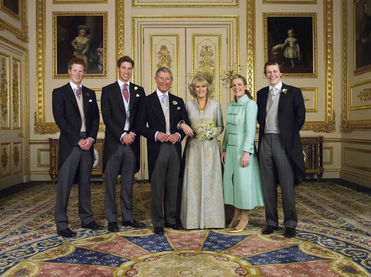 On the day of their wedding in April 2005, Charles and Camilla are joined by their children. On the left are Charles' sons Prince Harry and Prince William. On the right are Camilla's children Laura and Tom Parker Bowles.