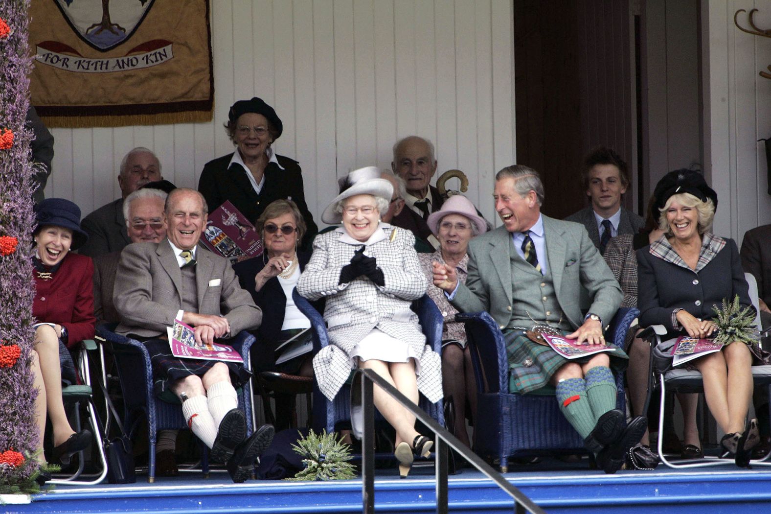 Charles and Camilla join Queen Elizabeth II and Prince Philip as they watch a tug-of-war competition in Braemar, Scotland, in September 2006.