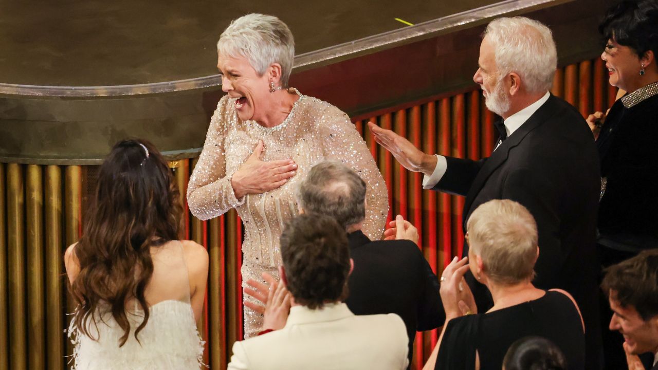 Jamie Lee Curtis (center) won a best supporting actress Oscar at the Academy Awards on Sunday.