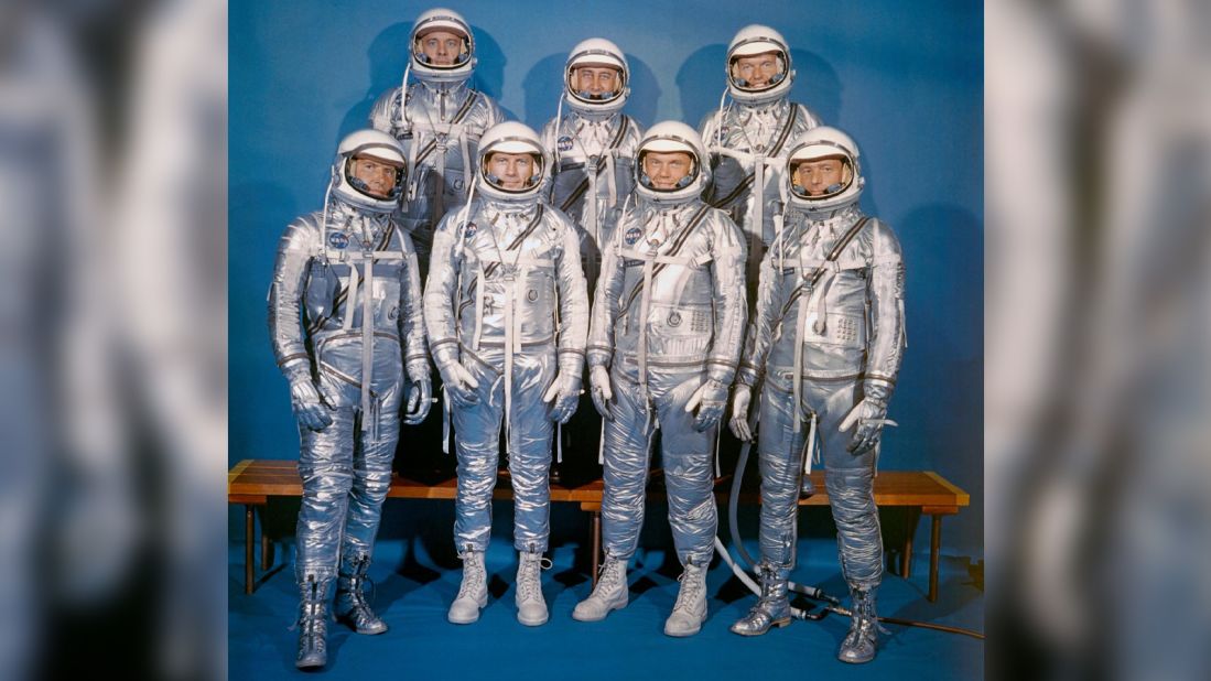 The seven men wearing spacesuits in this portrait made up the first group of astronauts announced by the National Aeronautics and Space Administration (NASA). They were selected in April of 1959 for the Mercury Program. In the front row, from left, are Walter M. Schirra Jr., Donald K. Slayton, John H. Glenn Jr., and M. Scott Carpenter. Standing in the back row, from left, are Alan B. Shepard Jr., Virgil I. Grissom and L. Gordon Cooper Jr. 
