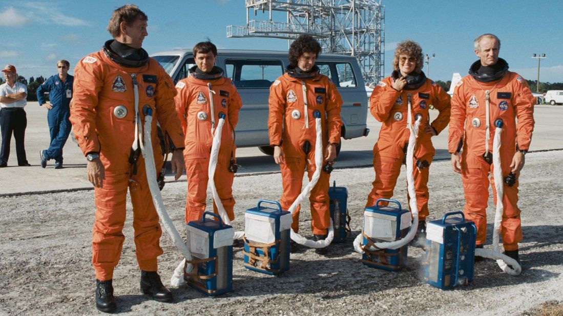 The astronaut crew members for NASA's STS-34 mission prepare to participate in emergency egress training at the shuttle landing facility while wearing their partially pressurized flight suits with attached cooling packs. This photo from September 13, 1989, features, from left, astronauts Michael J. McCulley, pilot; mission specialists Franklin R. Chang-Diaz, Ellen S. Baker and Shannon W. Lucid; and Donald E. Williams, mission commander.