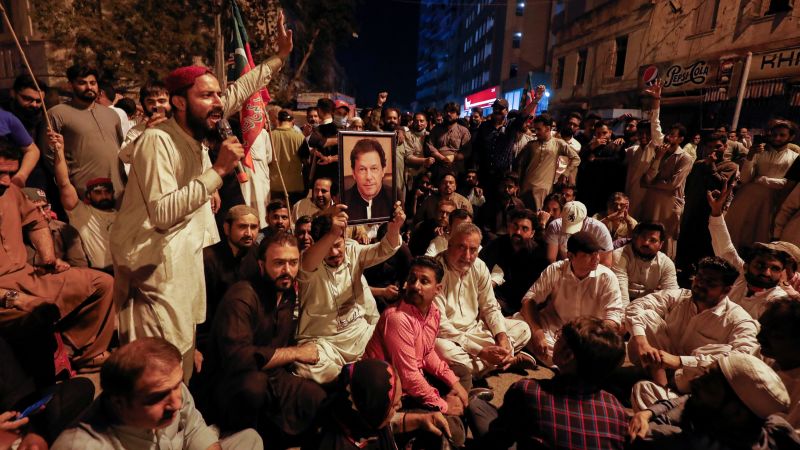 Imran Khan greets supporters outside home after Pakistan police arrest operation ends in chaos | CNN