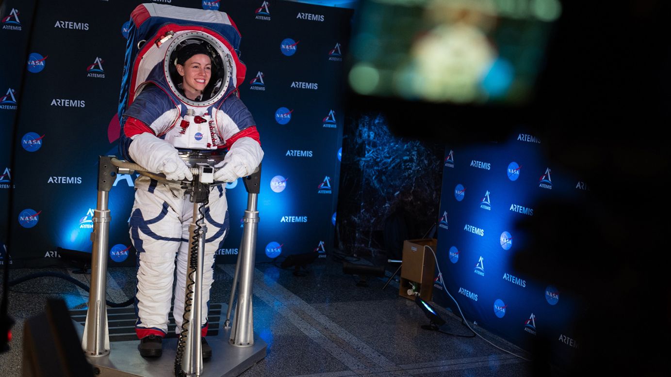 Kristine Davis, a spacesuit engineer at NASA's Johnson Space Center, wears a ground prototype of NASA's Exploration Extravehicular Mobility Unit (xEMU) during a demonstration on October 15, 2019, at NASA Headquarters in Washington. The xEMU was designed to improve on the suits previously worn on the moon during the Apollo era and those currently in use for spacewalks outside the International Space Station. 