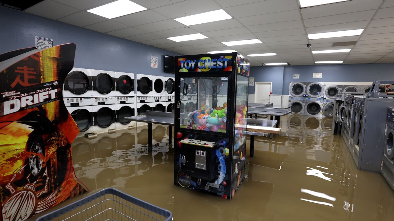 Floodwater fills the Pajaro Coin Laundry on Tuesday in Monterey County, California.