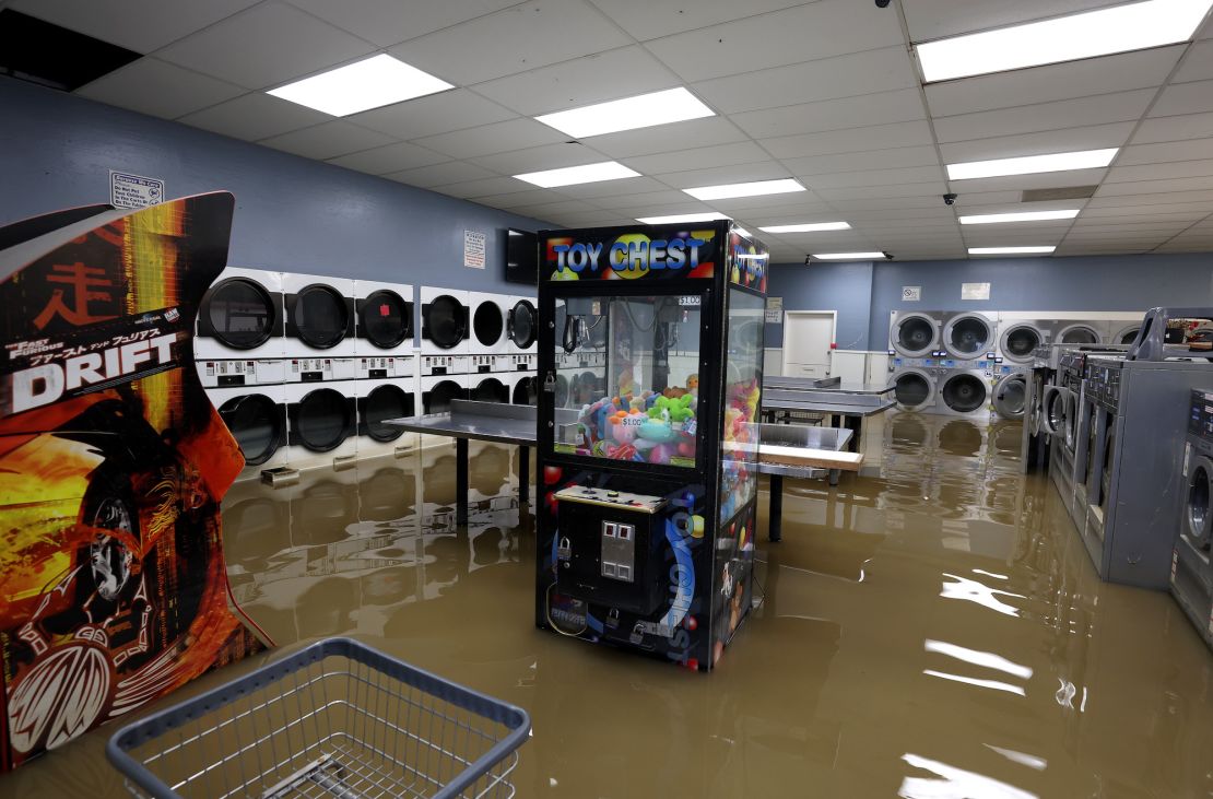 Floodwater fills the Pajaro Coin Laundry on Tuesday in Monterey County, California.