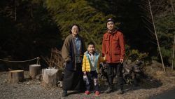 The Yokobori family: Miho, left, Kentaro, center, and Hirohito, right. Kentaro was born almost seven years ago, the first in 25 years in the area in Kamikawa village. 