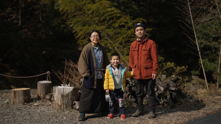 The Yokobori family: Miho, left, Kentaro, center, and Hirohito, right. Kentaro was born almost seven years ago, the first in 25 years in the area in Kamikawa village.