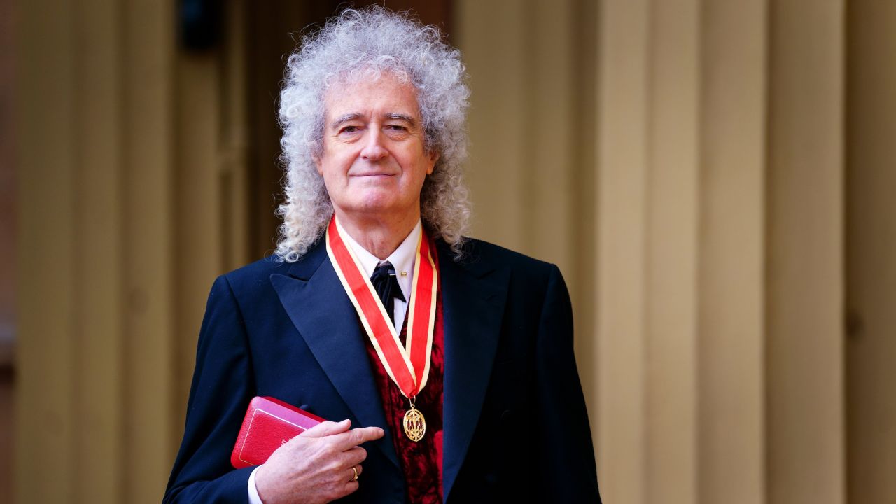 May was honored for services to music and charity.